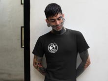 Lade das Bild in den Galerie-Viewer, THE SUMMONING tatooed man wearing goth halloween black T shirt showing  horned skull and pentagram design in occult gothic style