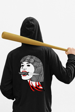 Load image into Gallery viewer, man-with-bat-hair-standing-in-back-wearing-Goth-Black-T-shirt-with-disembodied-woman's-head-gripping-a-dagger-in-her-teeth-Japanese-design-titled-CUT-ME-OPEN