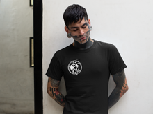 Load image into Gallery viewer, THE SUMMONING tatooed man wearing goth halloween black T shirt showing  horned skull and pentagram design in occult gothic style
